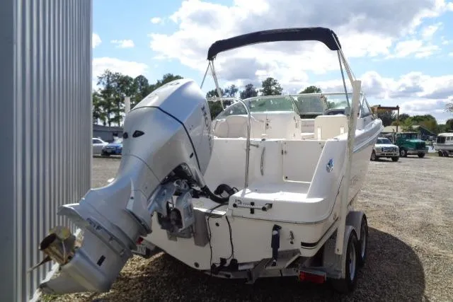 Slide: The Image of 2005 Robalo R227 Dual Console boat with outboard motor on trailer. - 9