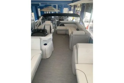Slide: The Image of 2026 Godfrey Sweetwater 2086 CSE pontoon boat interior with spacious seating and modern design. - 6