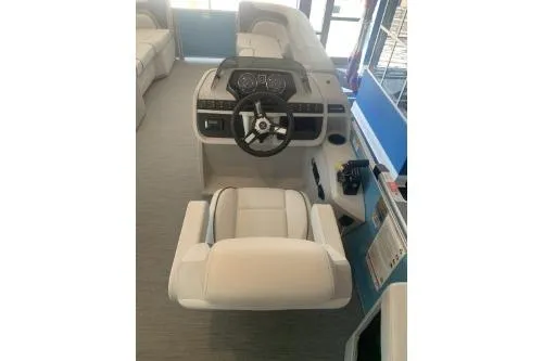 Slide: The Image of 2026 Godfrey Sweetwater 2086 CSE boat interior with modern helm and comfortable seating. - 7