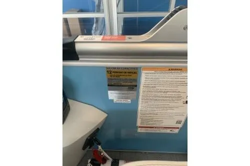 Slide: The Image of 2026 Godfrey Sweetwater 2086 CSE boat interior with safety and capacity labels. - 9