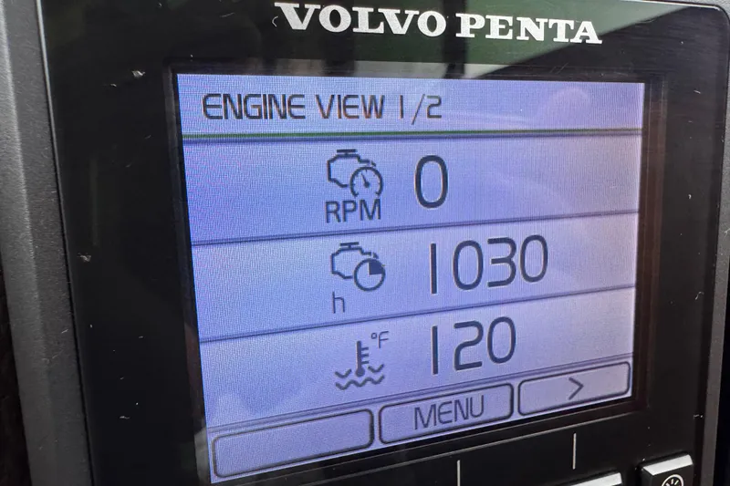 Slide: The Image of Volvo Penta engine display showing RPM, hours, and temperature on Ranger Tugs R-27, 2016. - 34