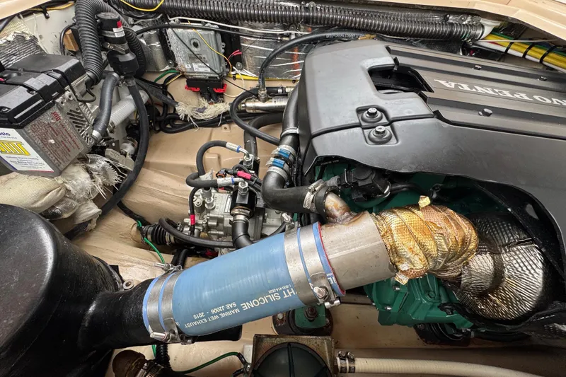 Slide: The Image of Engine compartment of a 2016 Ranger Tugs R-27 with Volvo Penta components. - 59