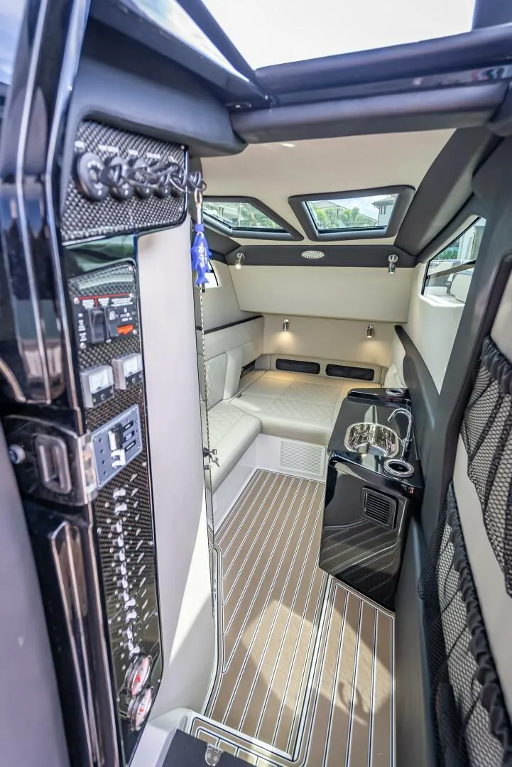 Slide: The Image of Luxurious interior of 2023 Nor-Tech 500 Sport boat, featuring modern seating and sleek design. - 25