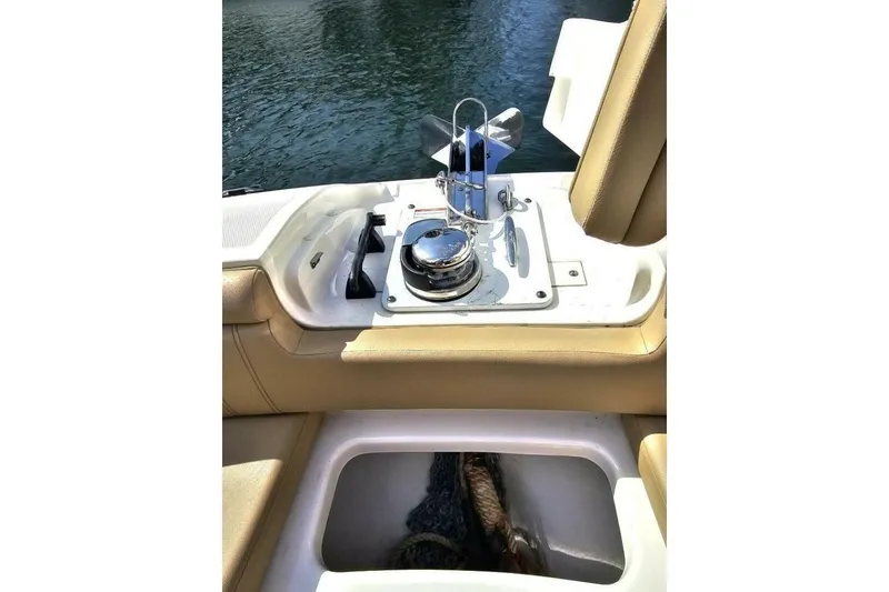 Slide: The Image of 2018 Sea Ray SDX 290 Outboard boat interior with anchor storage and seating. - 24