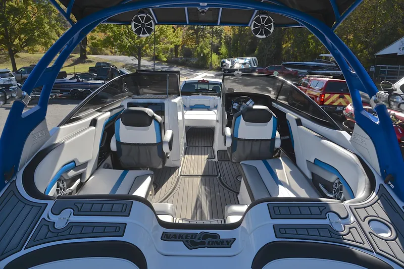 Slide: The Image of 2018 Yamaha Boats 242X interior with sleek seating and modern design. - 18