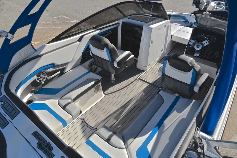 Slide: The Image of 2018 Yamaha Boats 242X interior with modern seating and sleek design. - 19