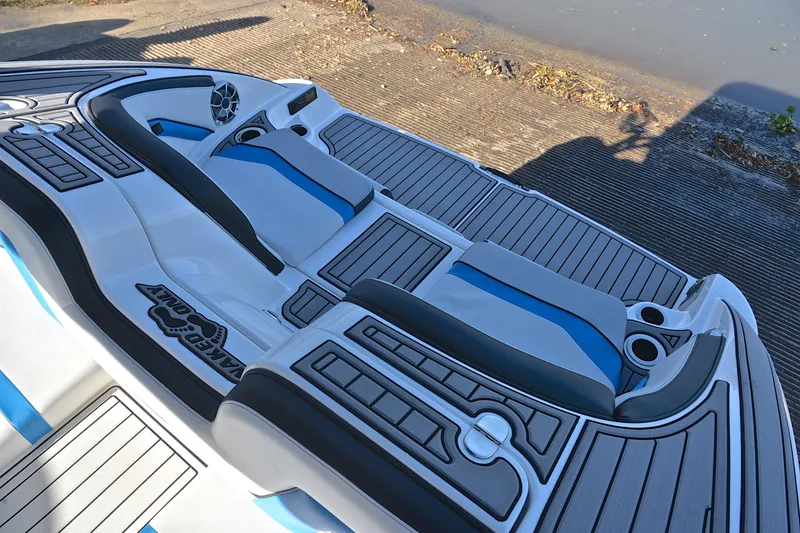 Slide: The Image of 2018 Yamaha Boats 242X interior with sleek seating and modern design. - 23