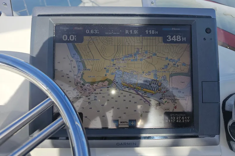 Slide: The Image of Garmin GPS display on 2015 Cutwater 30 Command Bridge, showing nautical chart and coordinates. - 12