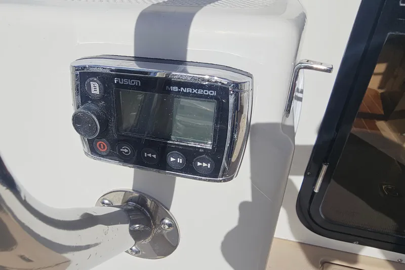 Slide: The Image of Fusion MS-NRX200i stereo control on 2015 Cutwater 30 Command Bridge boat. - 13