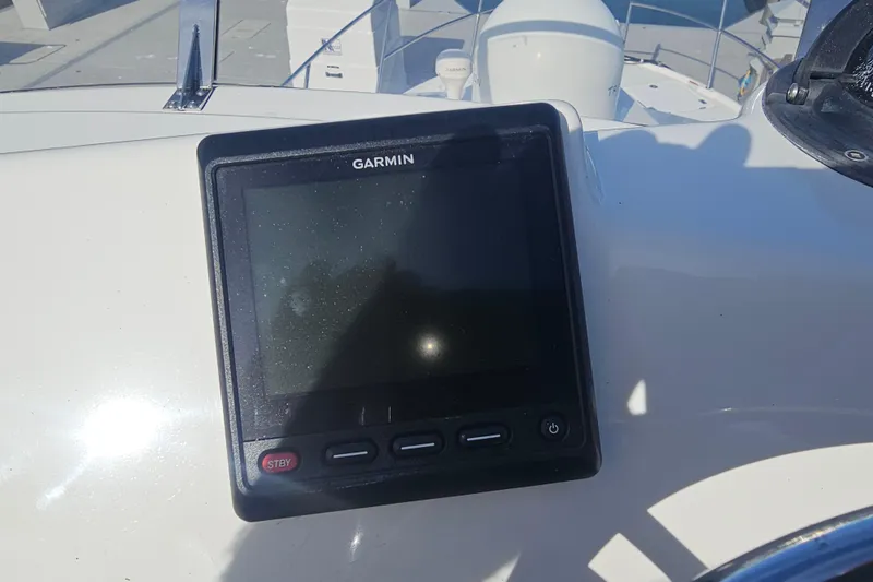 Slide: The Image of Garmin navigation display on 2015 Cutwater 30 Command Bridge boat dashboard. - 35