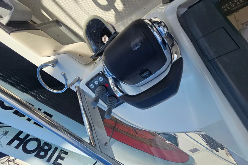 Slide: The Image of Control panel of a 2015 Cutwater 30 Command Bridge boat. - 58