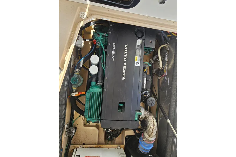 Slide: The Image of Engine compartment of a 2015 Cutwater 30 Command Bridge with Volvo Penta D6-370 engine. - 63