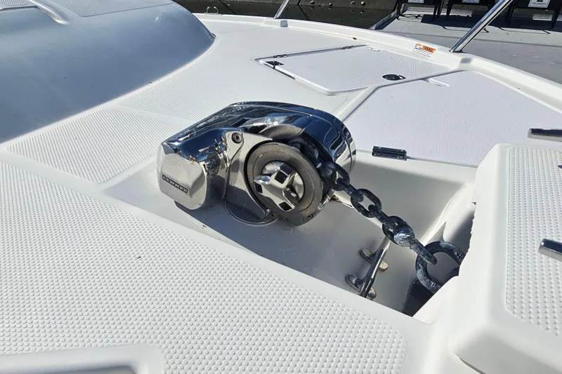 Slide: The Image of 2015 Cutwater 30 Command Bridge anchor winch on deck, showcasing marine equipment. - 7