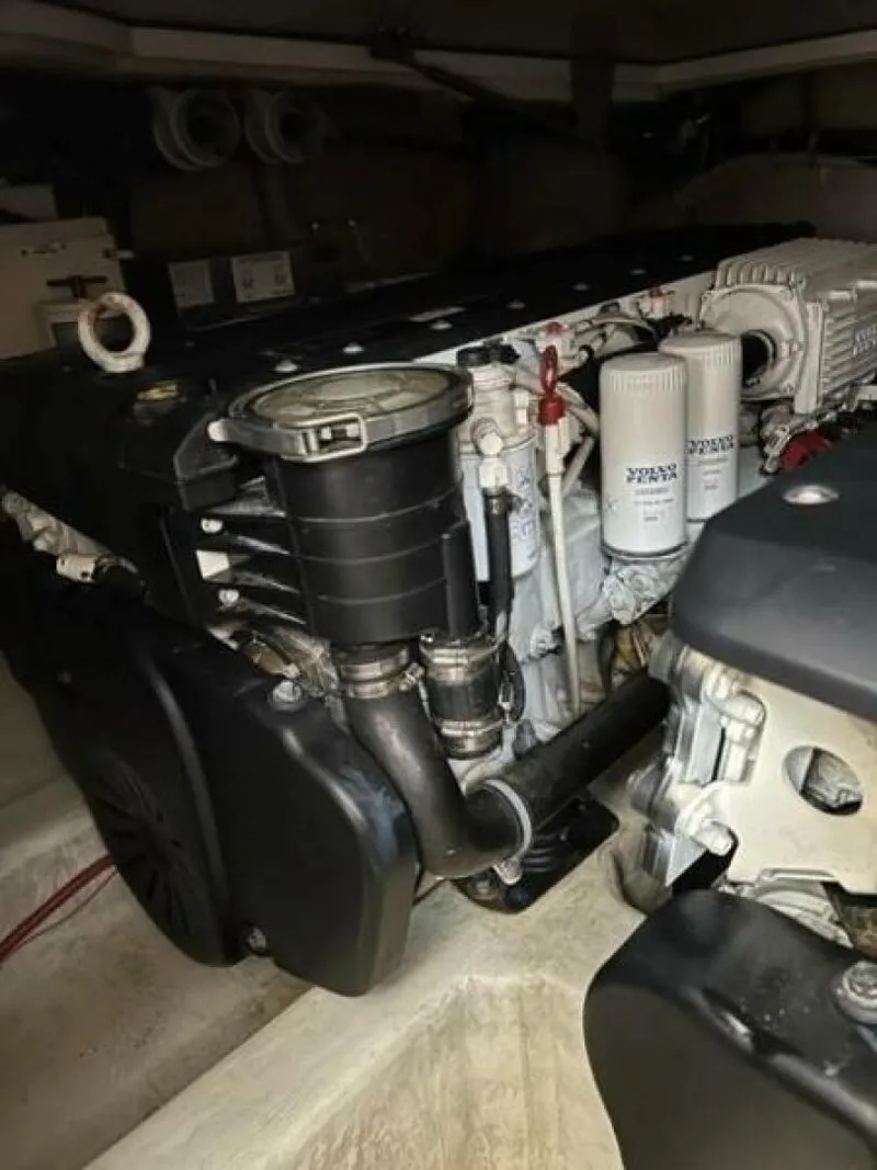 Slide: The Image of Engine of a 2012 Carver Sojourn, showcasing intricate components and filters. - 31