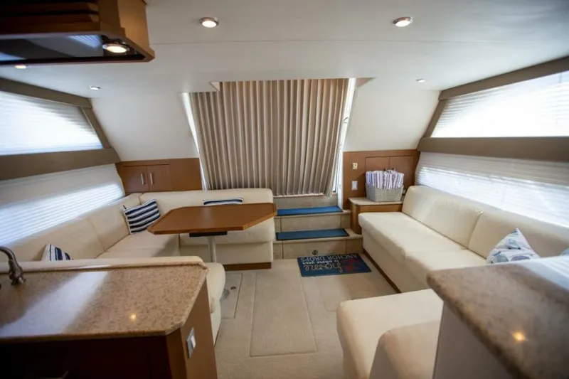 Slide: The Image of Luxurious interior of 2012 Carver Sojourn yacht with elegant seating and modern design. - 24