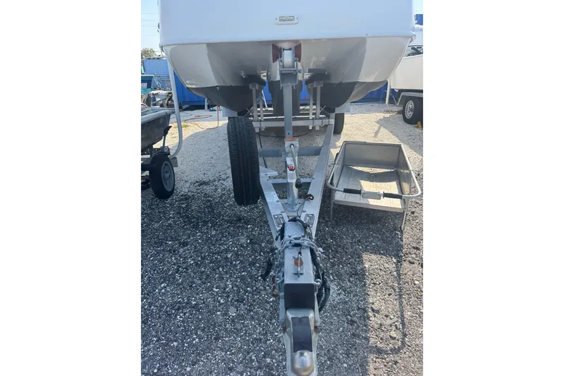 Slide: The Image of 2019 ElectraCraft 182TR boat on trailer, parked on gravel lot. - 10