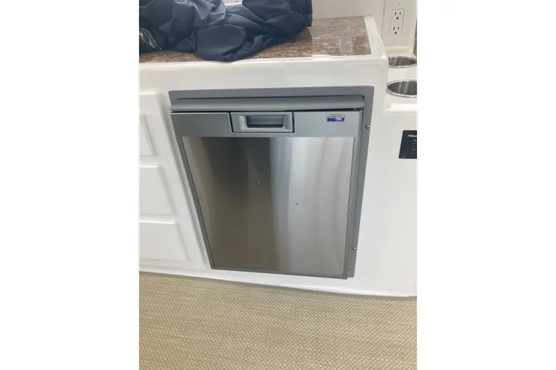 Slide: The Image of Stainless steel appliance on ElectraCraft 182TR boat, 2019 model, with countertop and outlet. - 12