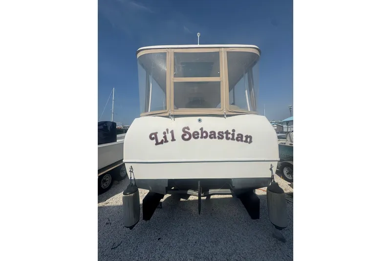 Slide: The Image of 2019 ElectraCraft 182TR boat named "Li'l Sebastian" on display, rear view. - 5