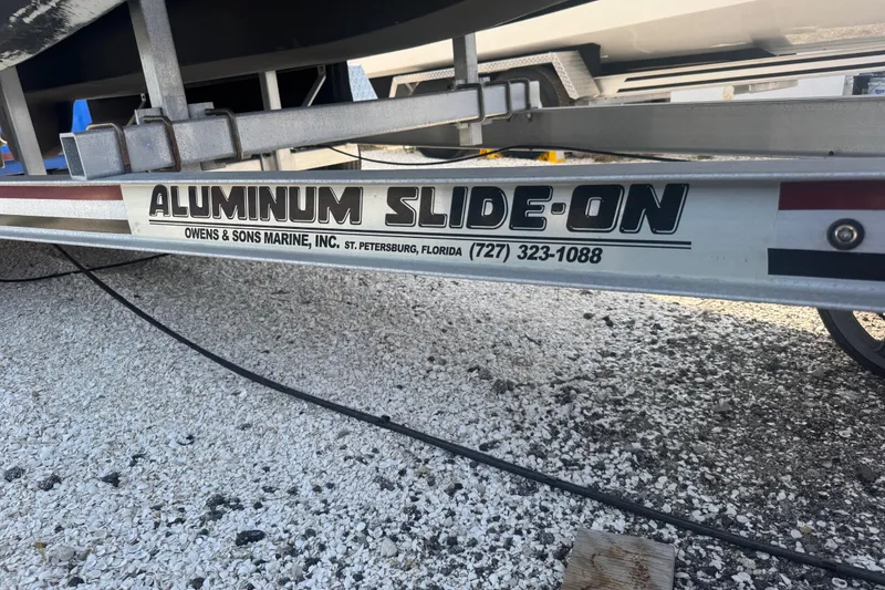 Slide: The Image of Aluminum Slide-On trailer by Owens & Sons Marine, supporting ElectraCraft 182TR, 2019 model. - 9