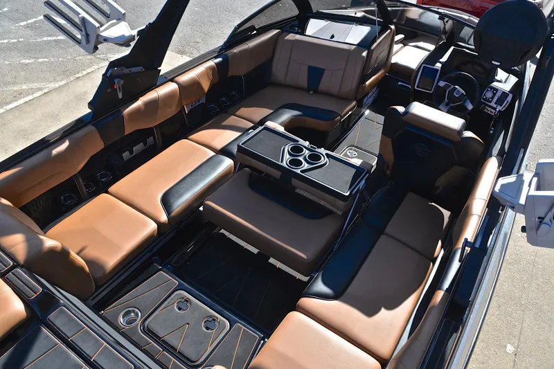 Slide: The Image of 2023 Malibu Wakesetter 23 LSV interior with luxurious seating and modern dashboard design. - 19