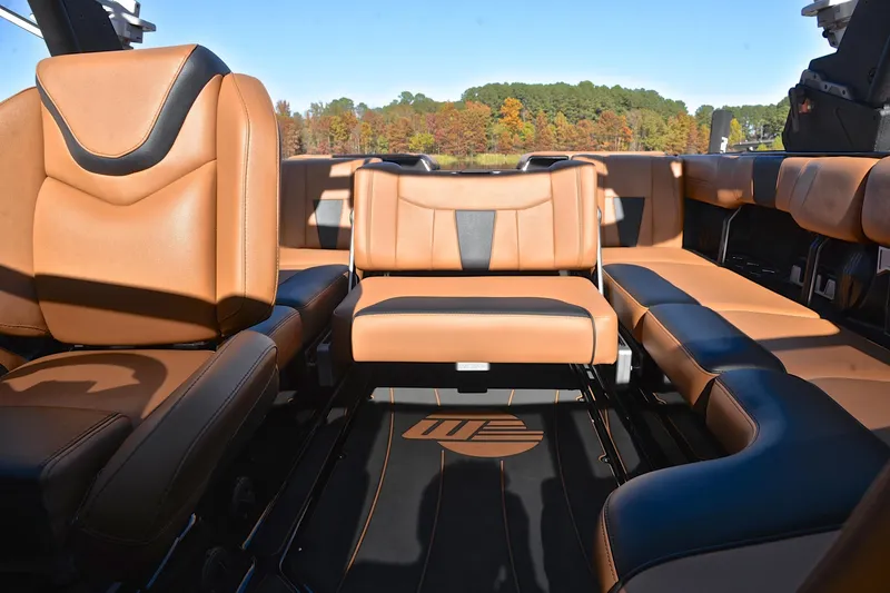 Slide: The Image of 2023 Malibu Wakesetter 23 LSV interior with luxurious tan seating and sleek design. - 23
