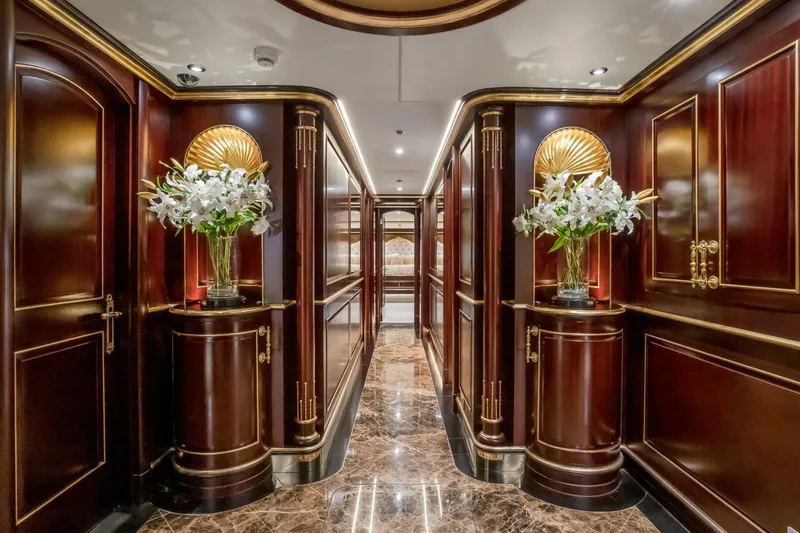 Slide: The Image of Luxurious interior of 2009 Horizon Model Tri-Deck yacht with elegant wood paneling and floral decor. - 37