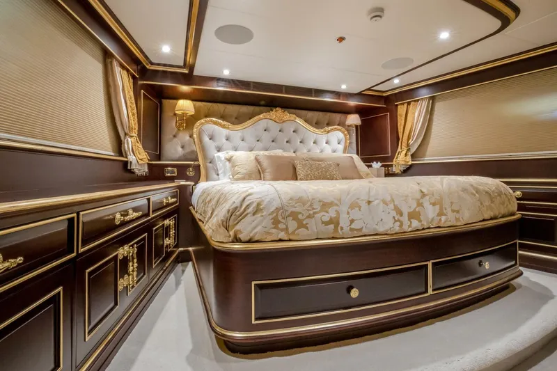 Slide: The Image of Luxurious bedroom on 2009 Horizon Model Tri-Deck yacht with elegant decor and plush bedding. - 38