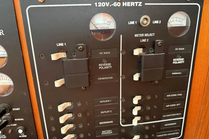 Slide: The Image of Electrical control panel of a 2003 Hunter 44 Deck Salon sailboat. - 20