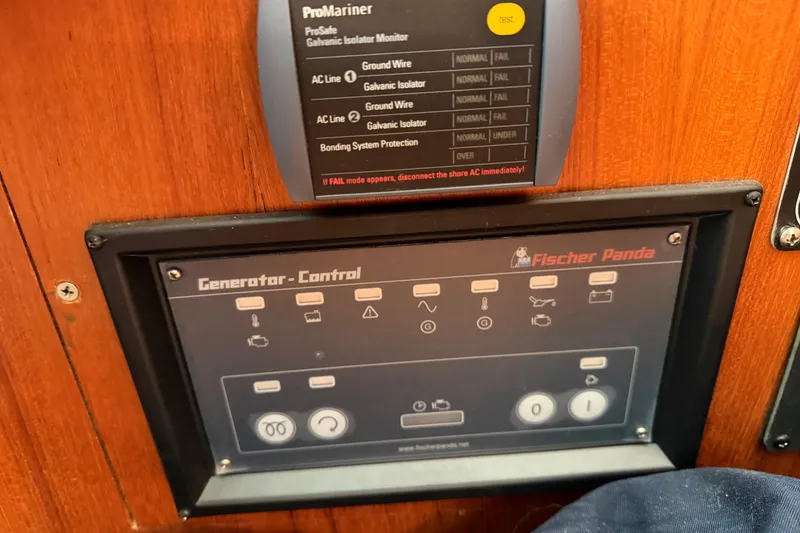 Slide: The Image of Control panel of a 2003 Hunter 44 Deck Salon with Fischer Panda generator. - 22