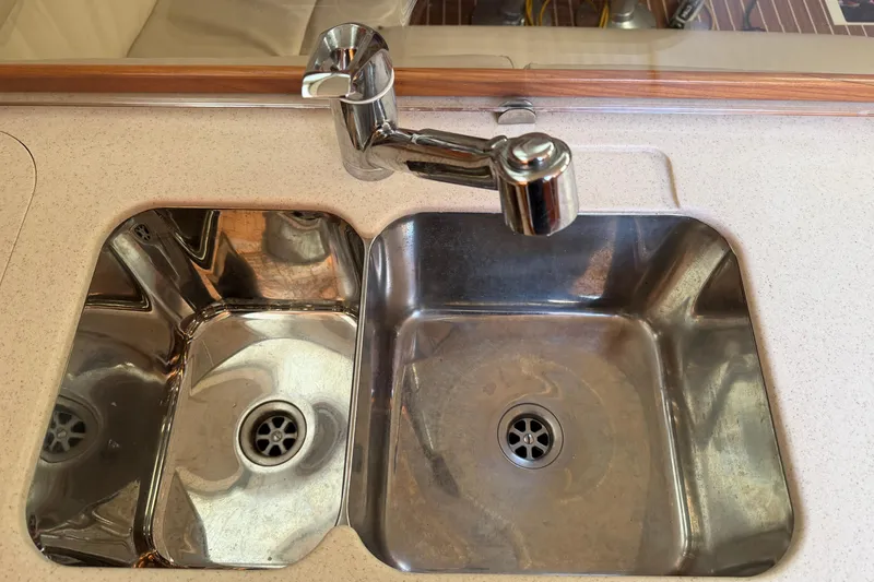 Slide: The Image of Stainless steel double sink in 2003 Hunter 44 Deck Salon yacht kitchen. - 27