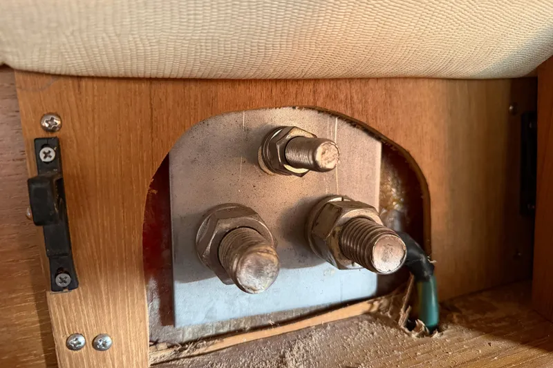 Slide: The Image of Close-up of bolts and wiring inside a 2003 Hunter 44 Deck Salon yacht. - 41