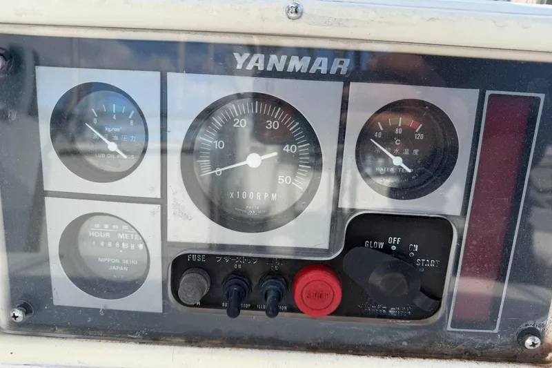 Slide: The Image of Control panel of a 2003 Hunter 44 Deck Salon with Yanmar engine gauges. - 57