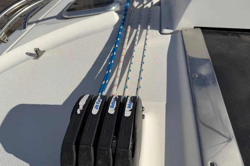 Slide: The Image of Close-up of rope clutches on a 2003 Hunter 44 Deck Salon sailboat deck. - 62