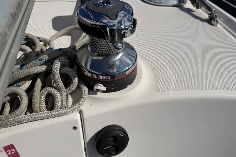 Slide: The Image of Winch and ropes on 2003 Hunter 44 Deck Salon sailboat deck. - 63