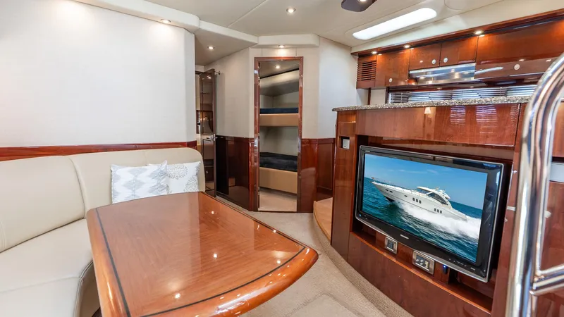 Slide: The Image of Luxurious interior of 2008 Sea Ray Sundancer yacht with elegant wood finishes and modern amenities. - 20