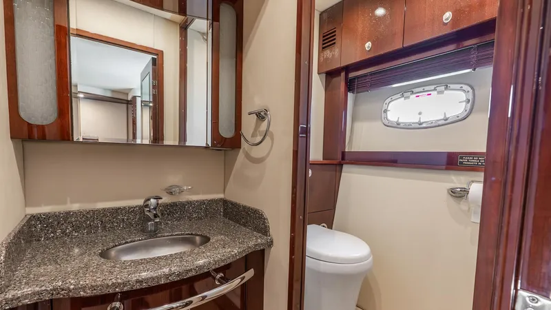 Slide: The Image of Luxurious bathroom in 2008 Sea Ray Sundancer yacht with granite countertop and modern fixtures. - 21