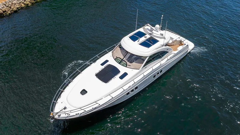 Slide: The Image of 2008 Sea Ray Sundancer yacht cruising on open water, aerial view. - 5