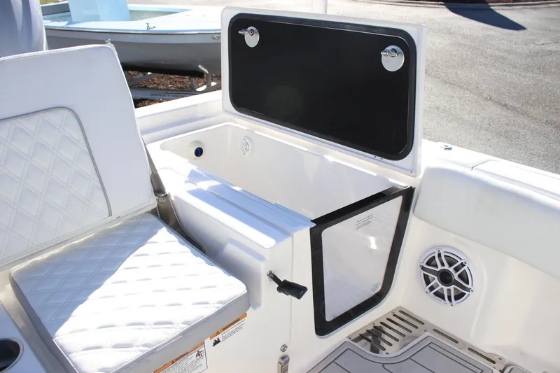 Slide: The Image of 2026 Sea Fox 282 Hybrid LT boat interior with seating and storage compartments. - 21