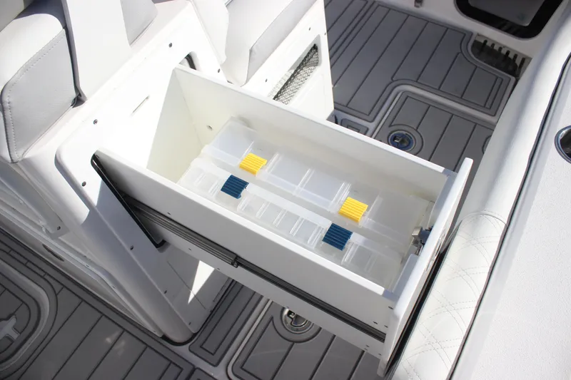 Slide: The Image of Storage drawer on 2026 Sea Fox 282 Hybrid LT boat with tackle boxes. - 29