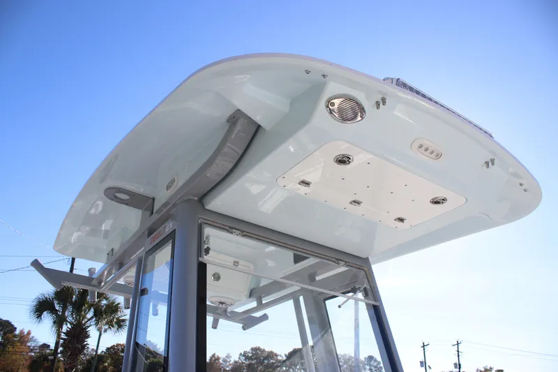 Slide: The Image of 2026 Sea Fox 282 Hybrid LT boat top view under clear blue sky. - 32