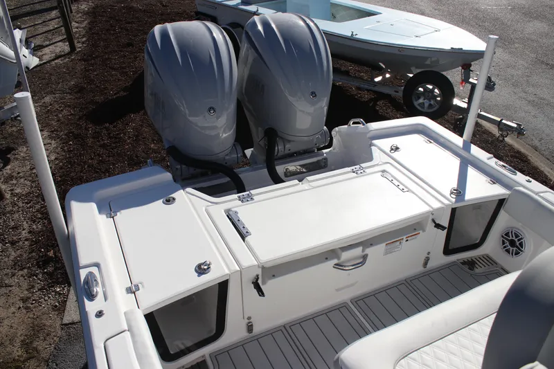 Slide: The Image of 2026 Sea Fox 282 Hybrid LT boat with dual outboard engines, rear deck view. - 9