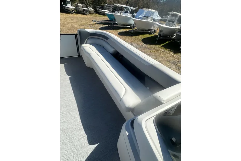 Slide: The Image of 2026 Godfrey Sweetwater 2286 Cruise Special Edition boat interior with spacious seating. - 20