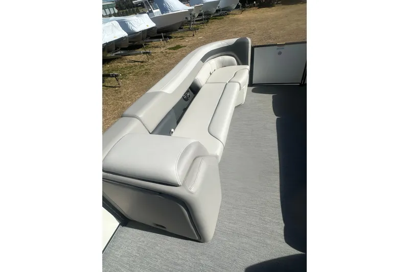 Slide: The Image of 2026 Godfrey Sweetwater 2286 Cruise Special Edition boat interior with plush seating. - 21