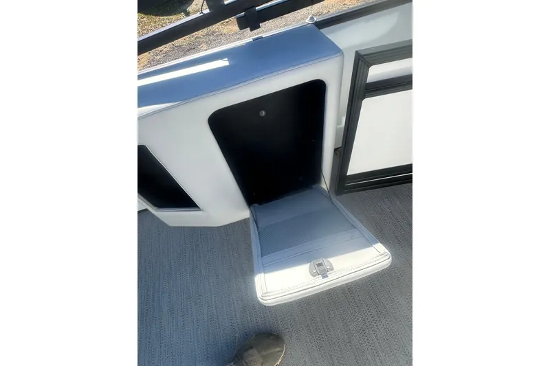 Slide: The Image of Open storage compartment on 2026 Godfrey Sweetwater 2286 Cruise Special Edition boat. - 26