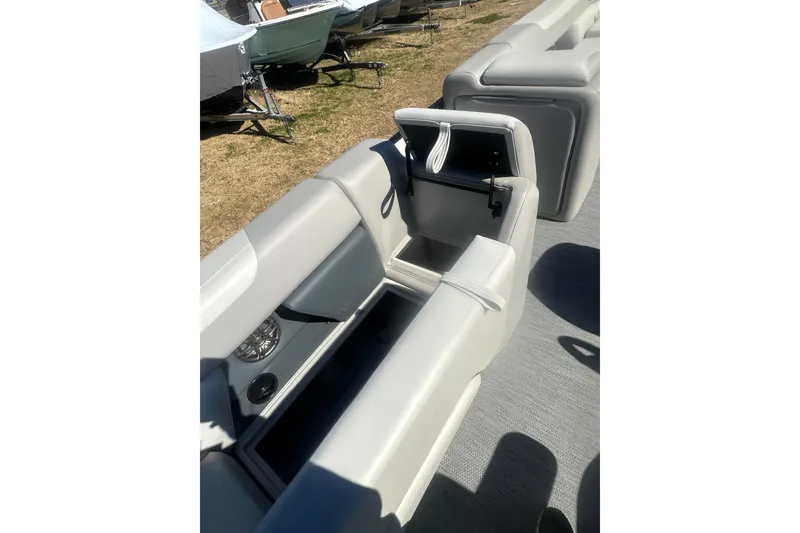 Slide: The Image of 2026 Godfrey Sweetwater 2286 Cruise Special Edition boat interior with storage compartment. - 28