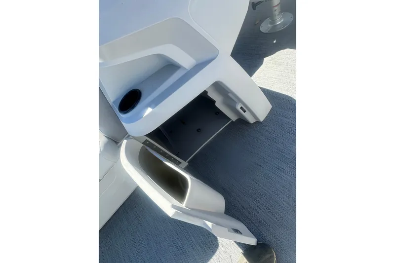 Slide: The Image of Open storage compartment on 2026 Godfrey Sweetwater 2286 Cruise Special Edition boat. - 29