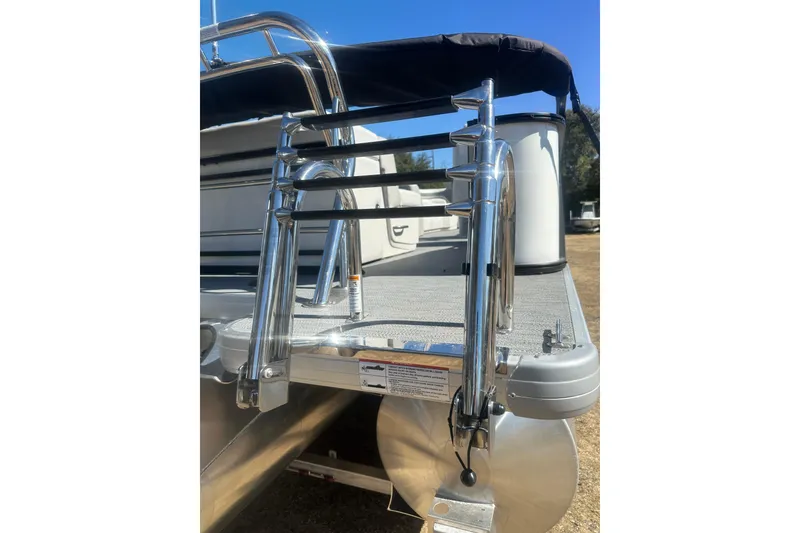 Slide: The Image of 2026 Godfrey Sweetwater 2286 Cruise Special Edition boat ladder and deck detail. - 35