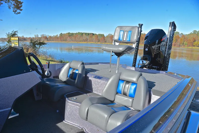Slide: The Image of 2023 Bullet 21XRS boat interior with seating and water view. - 18