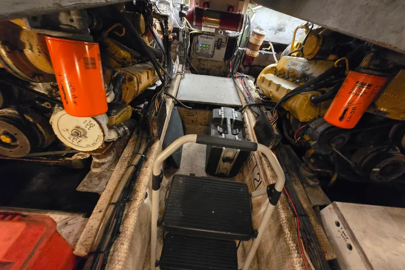 Slide: The Image of Engine room of a 1980 Jersey 40FT Convertible boat with visible machinery and equipment. - 29