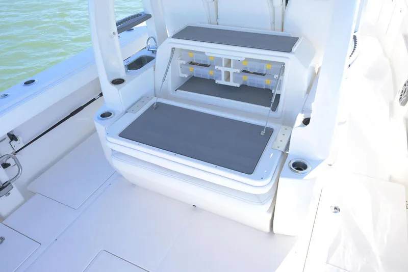Slide: The Image of 2025 Solace 37 CS boat interior with seating and storage compartments. - 12